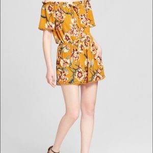 Mustard yellow floral romper w/pom detail nwot